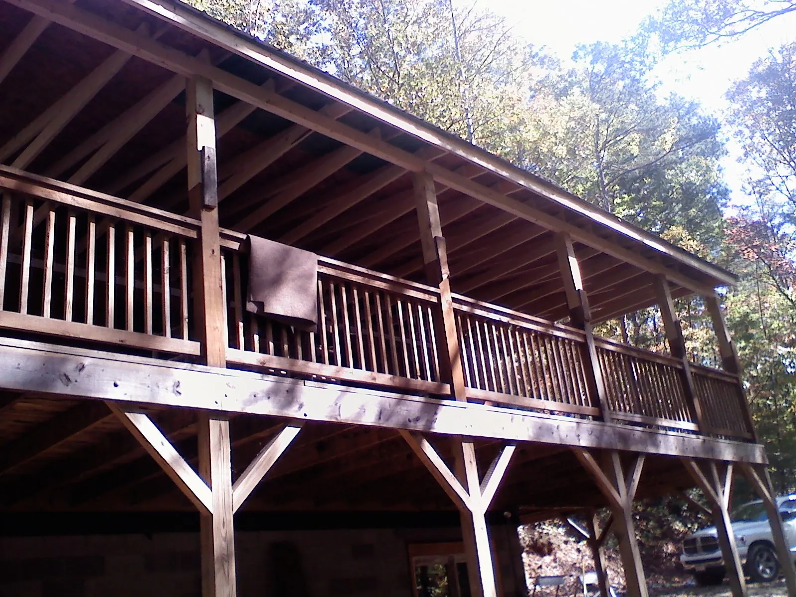 Timber framing under a new elevated porch and deck — Roof Leak Repair in Plainfield by Roofing Brothers